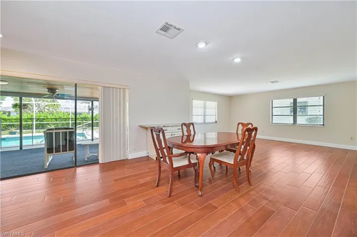 Dining space with Tile flooring and recessed lighting