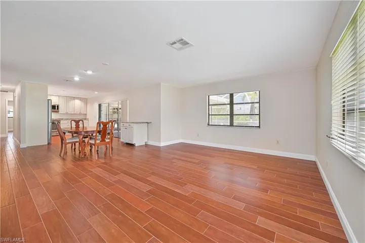 Bright open floor plan with tile throughout and natural light