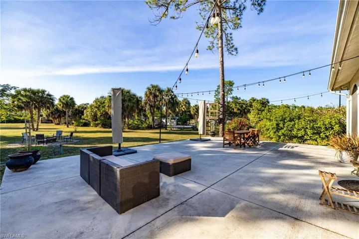 View of patio with outdoor dining area
