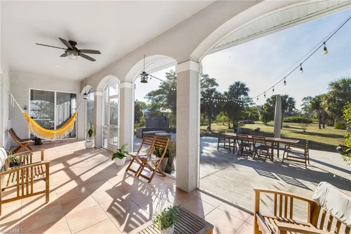 View of patio / terrace with a ceiling fan and outdoor dining space