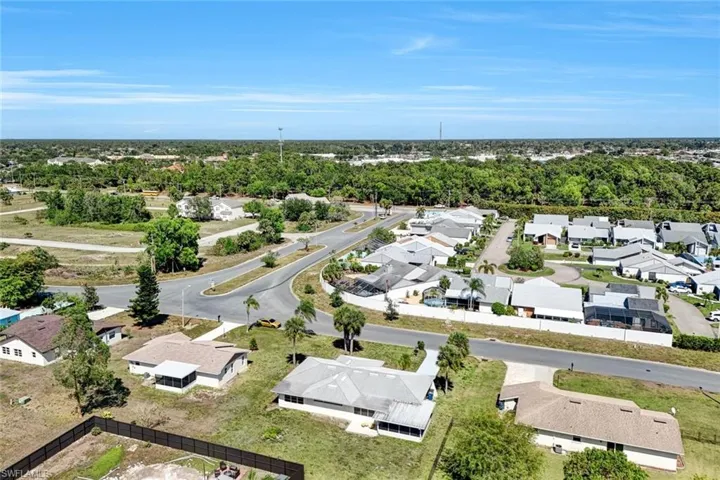 Birds eye view of property with a residential view