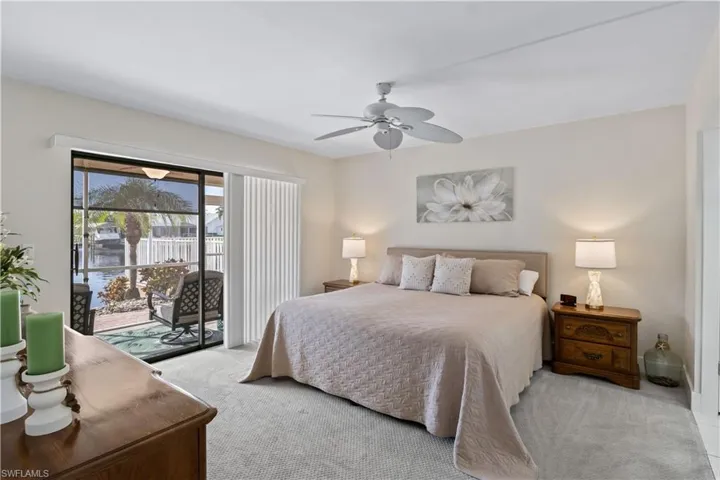 Primary bedroom with large walk in closet and en suite bathroom.