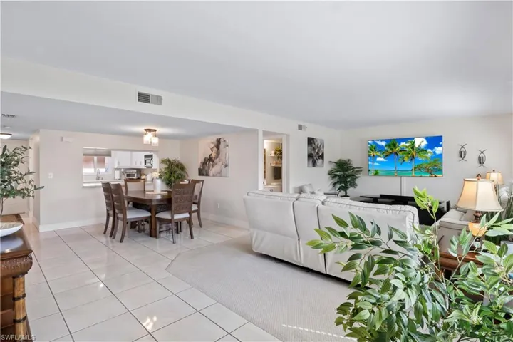 Kitchen, living and dining are open to one another.