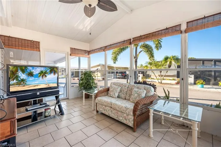 Sunroom / solarium featuring tile patterned flooring