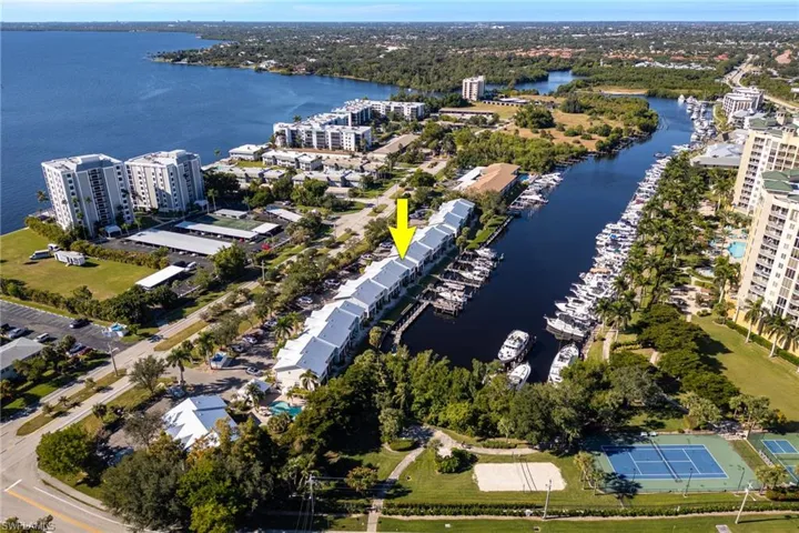 Waterfront townhome community featuring individual boat slips