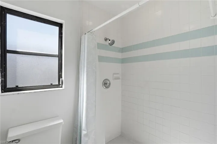 Bathroom featuring a stall shower