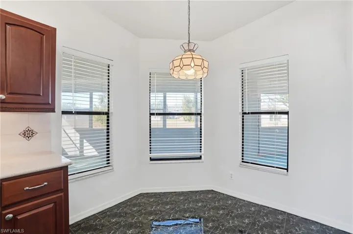 Unfurnished dining area featuring healthy amount of natural light