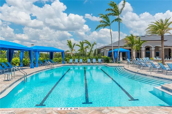 View of swimming pool featuring a patio area and a gazebo