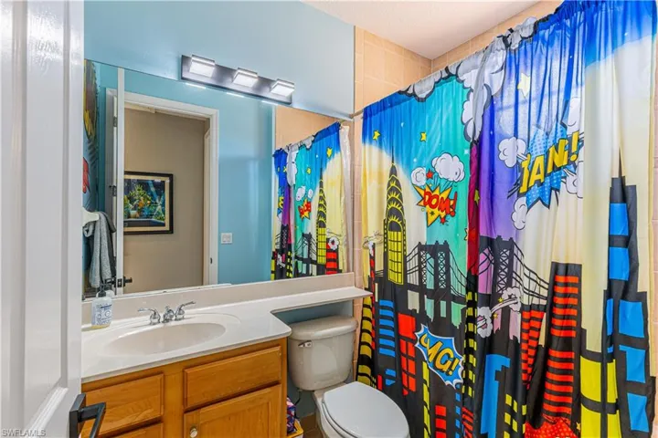 Bathroom with vanity and toilet