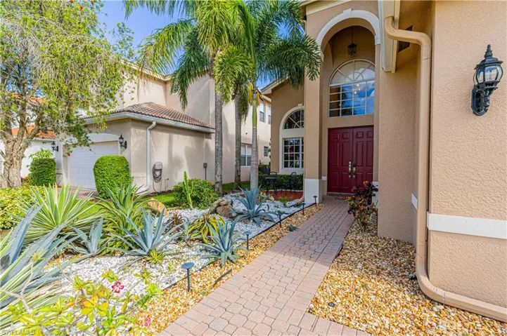 Entrance to property featuring a garage
