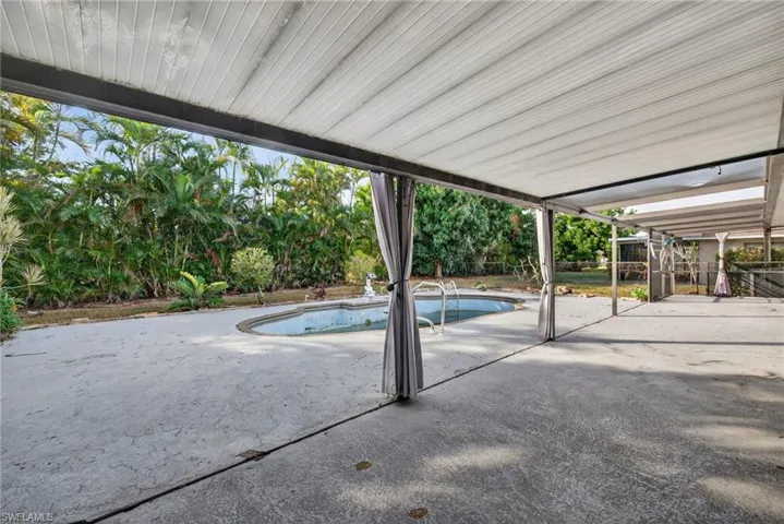 Outdoor pool with a patio area