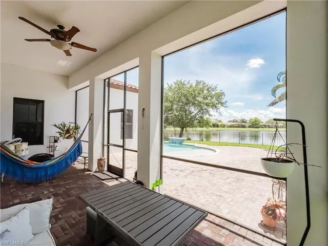 Sunroom with a water view