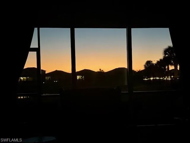 Expansive window framing a twilight sky