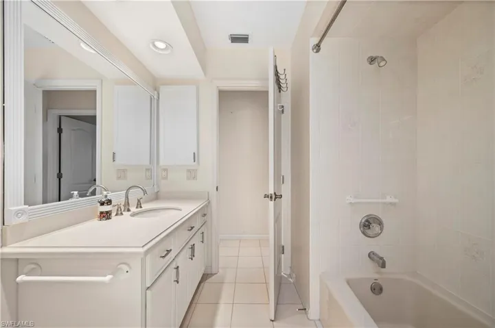 Second Bathroom, door to hallway shown. Tub/shower combo.