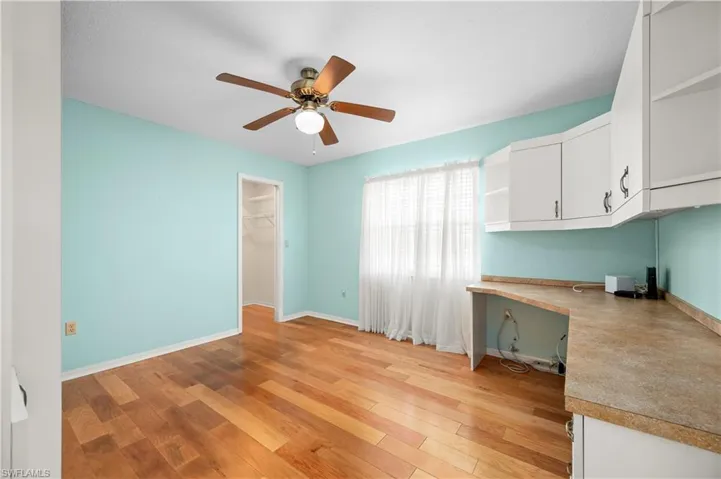 Third Bedroom with built-in desk, storage cabinets, walk-in closet and built-in Trundle bed