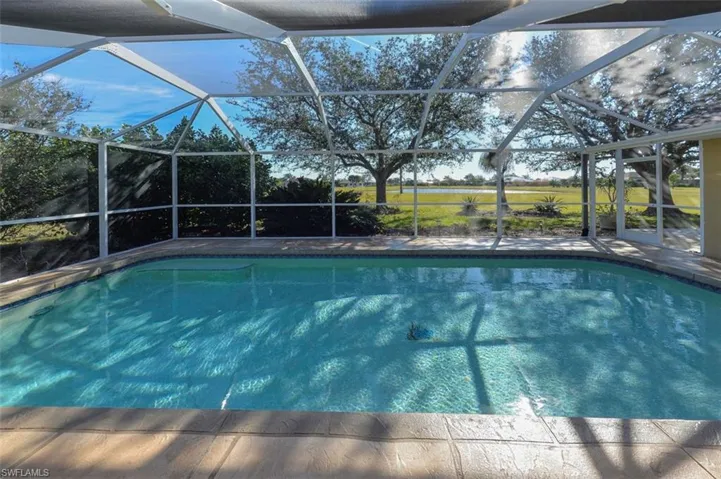 View of pond from the swimming pool and lanai