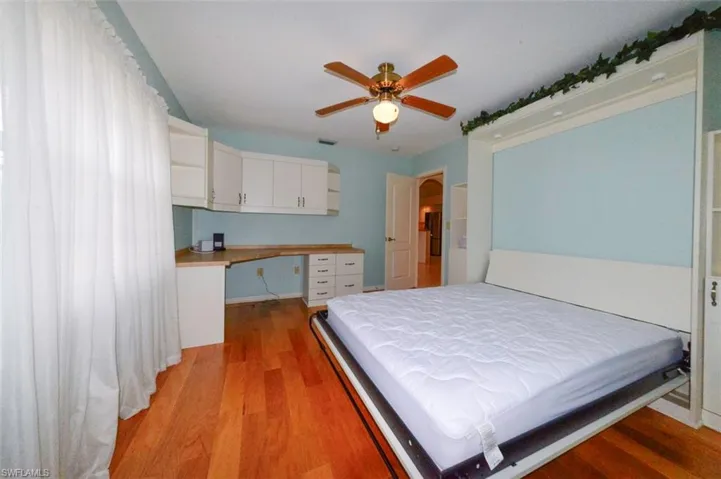 Third bedroom with trundle bed shown open