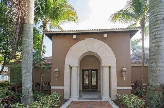 View of exterior entry featuring french doors