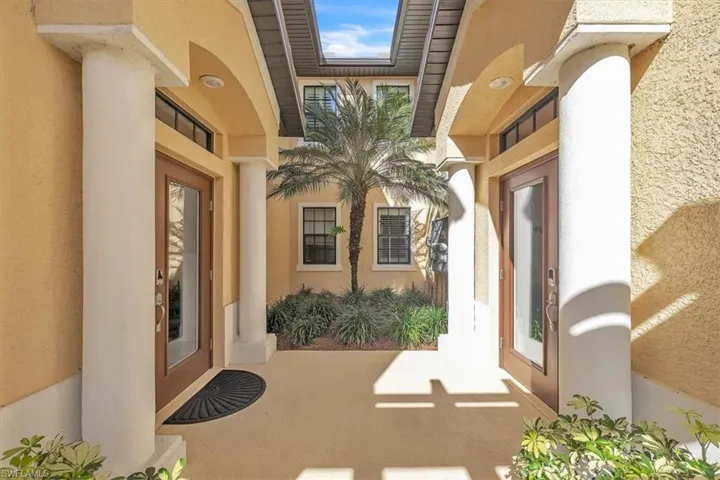 Quaint entry with garden