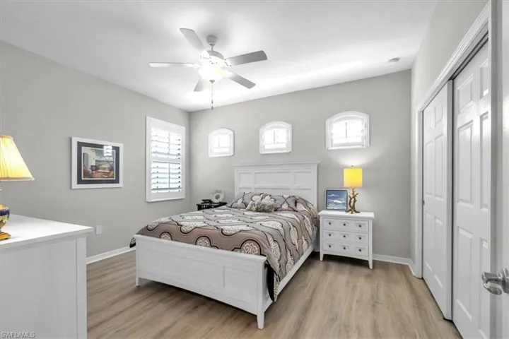 Guest bedroom with lots of natural light and upgraded flooring.  Furniture included.