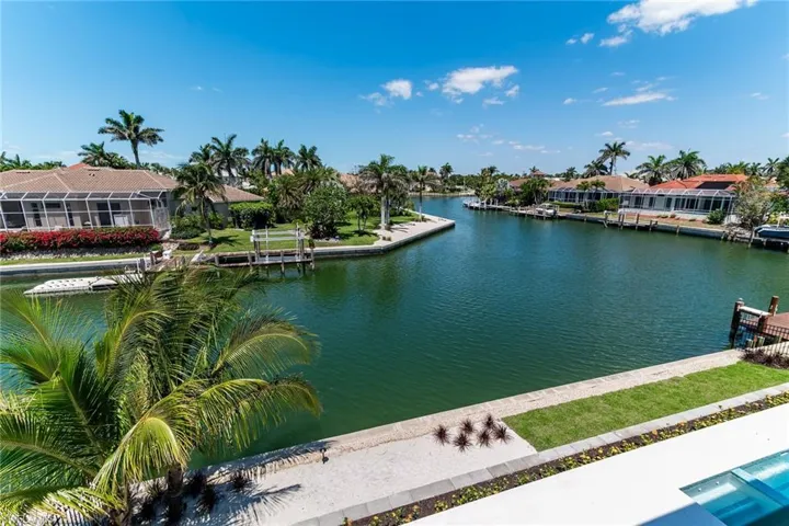 View of water feature with a boat dock and a residential view