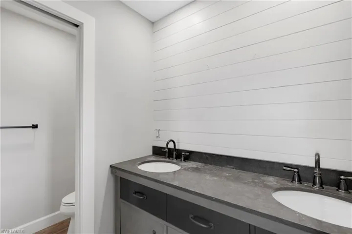 Bathroom with vanity and toilet