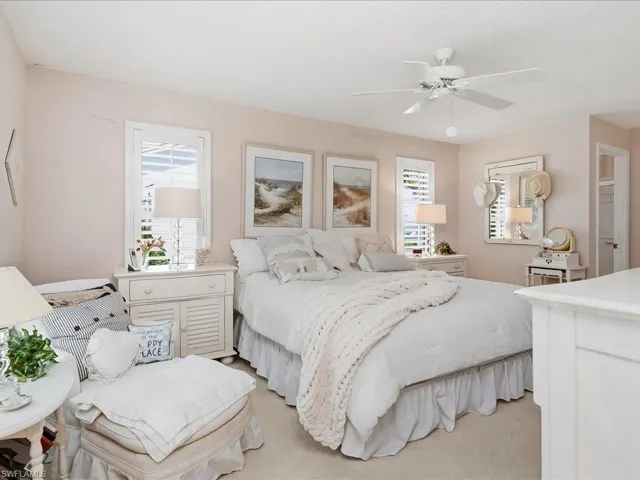 Large Primary bedroom with a walk in closet.