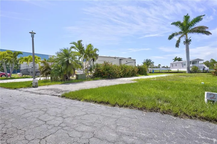 View of community featuring a yard