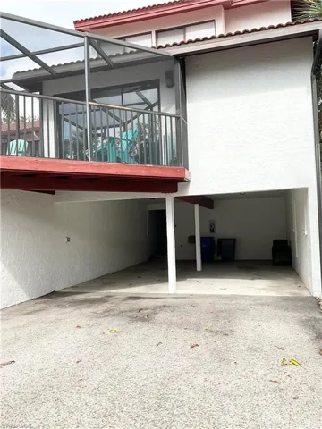 Covered carport is on right