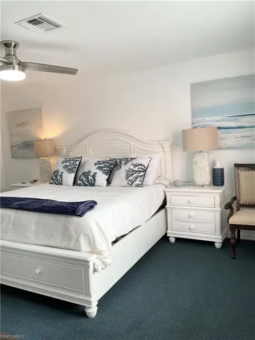 Primary bedroom has king bed and two closets