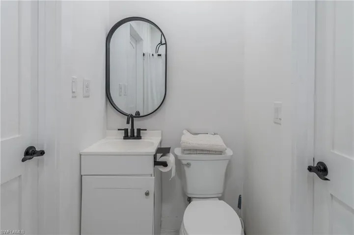 Bathroom with vanity and a shower with curtain
