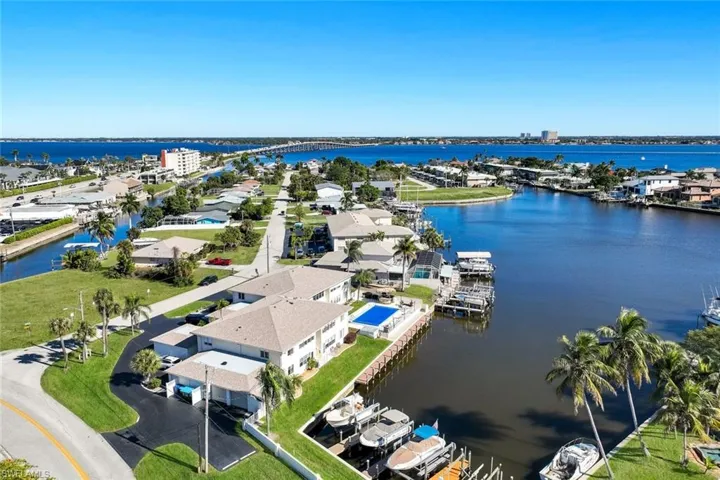 Aerial view of a large body of water and a notable bridge