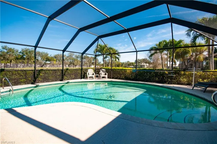 Large lanai and screened in pool area