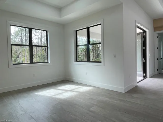 Unfurnished room with light wood-type flooring