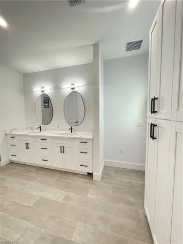Bathroom featuring vanity