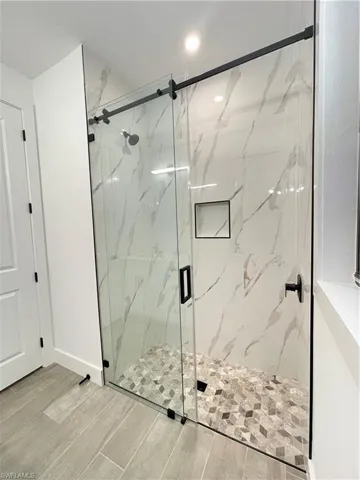 Bathroom with an enclosed shower