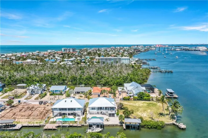 This home sits right at the mouth of the canal that spills into the bay.