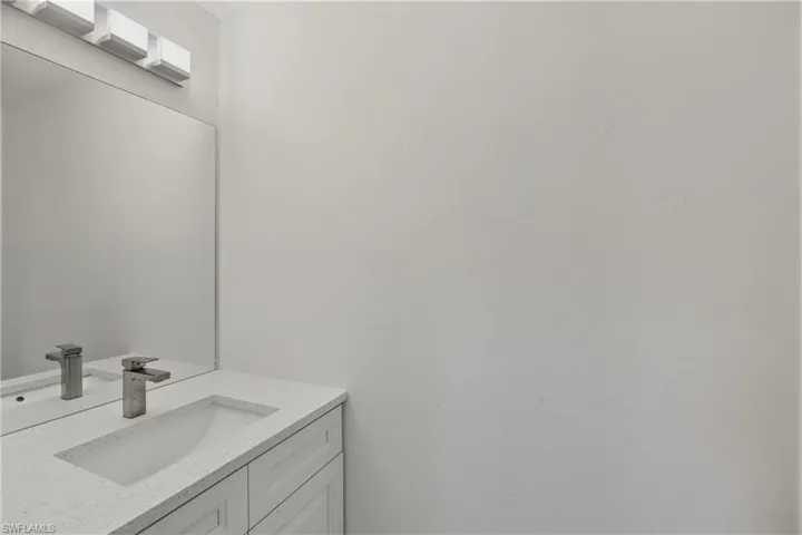 Bathroom with vanity off bonus room