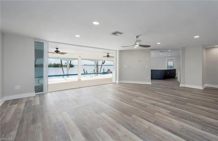 opens to kitchen and back lanai