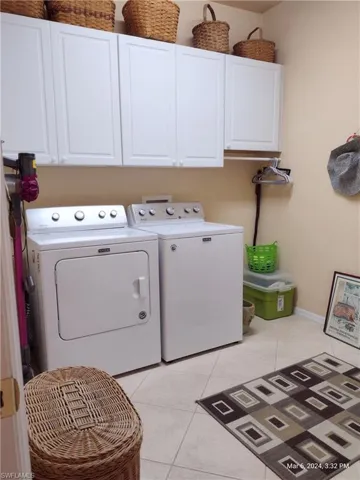 --Laundry Room w/ Custom Cabinets.