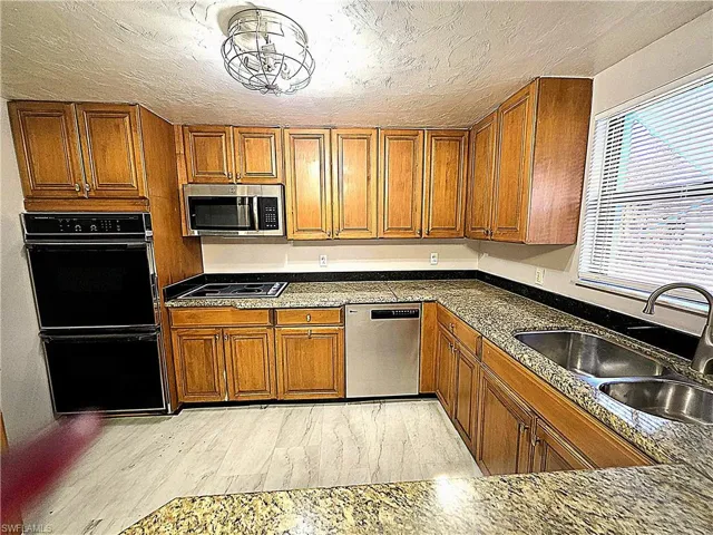 Real wood cabinets, granite countertop