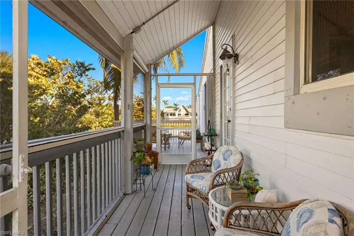 Sunroom with vaulted ceiling