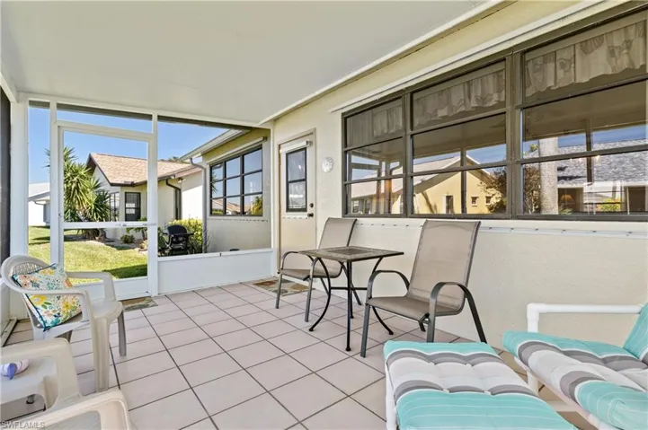 Sunroom featuring plenty of natural light