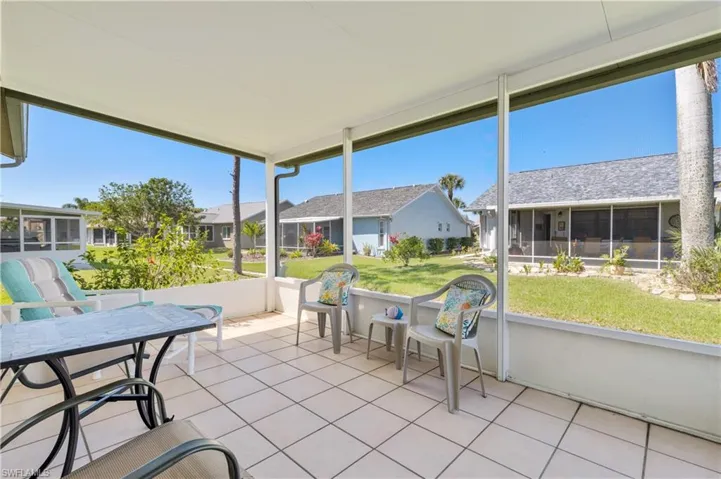 Sunroom with a residential view