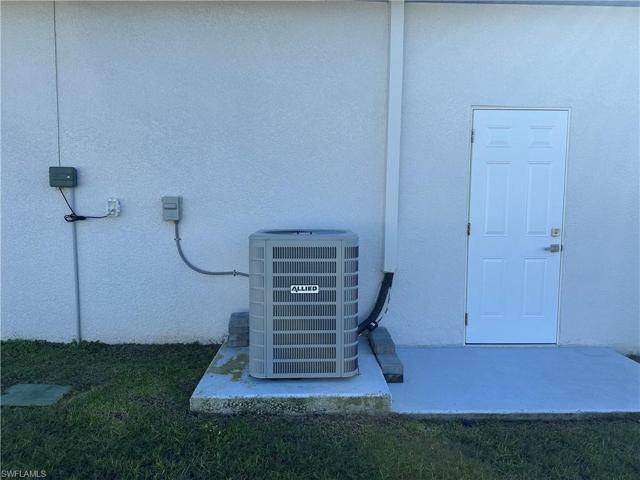 AC & Exterior Side Garage Door
