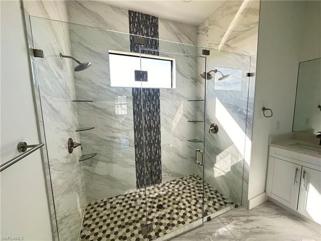 Stunning Double Shower w/frameless enclosure