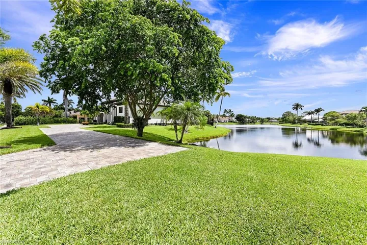 Side yard/lake/extended driveway