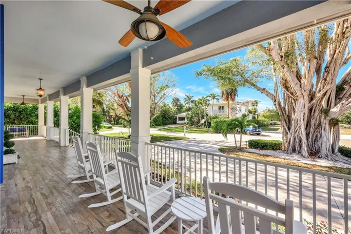 Wrap around front porch with plenty of seating