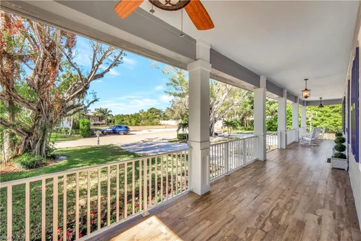 Wrap around front porch with plenty of seating