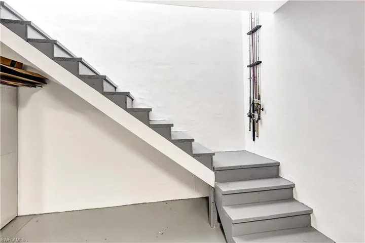 View of stairs leading to gameroom from garage